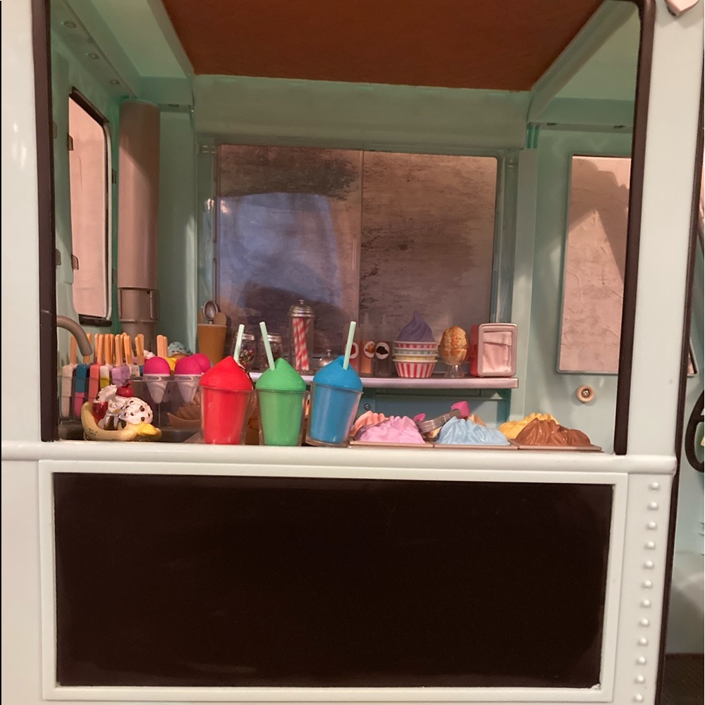 Our Generation ice cream truck! Used with tags still on! Teal blue!